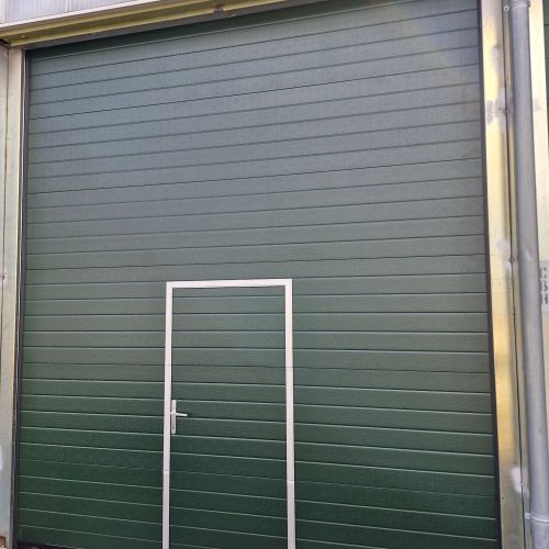 Image de PORTE DE GARAGE SECTIONNELLE AVEC PORTILLON